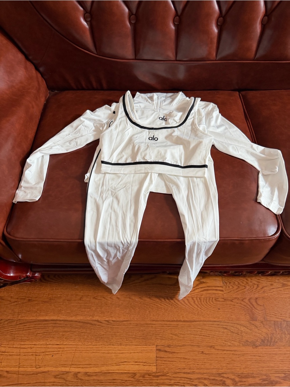 ALO Yoga Kids White One-Piece with Black Trim